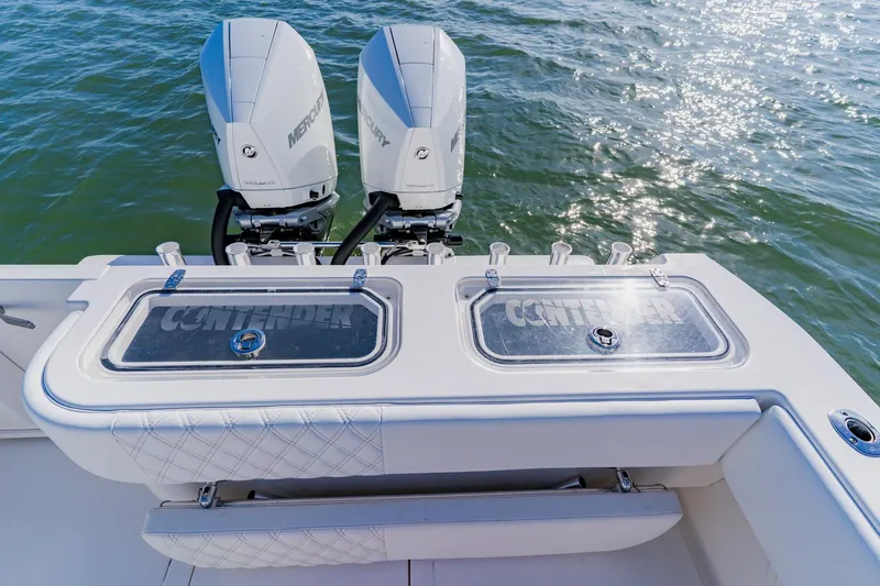  Yacht Photos Pics 2025 Contender 32 ST boat with dual Mercury engines on the water.