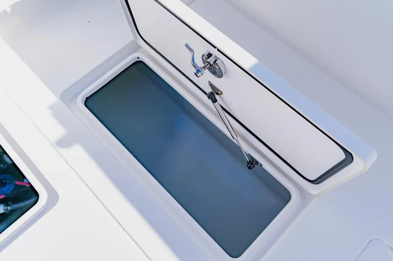  Yacht Photos Pics Open storage compartment on 2025 Contender 32 ST boat.