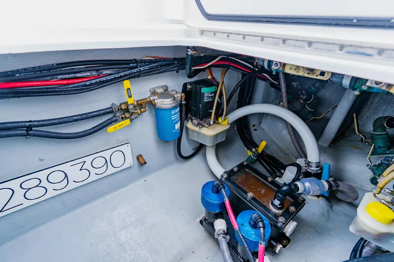  Yacht Photos Pics Engine compartment of 2025 Contender 32 ST boat, showcasing wiring and components.