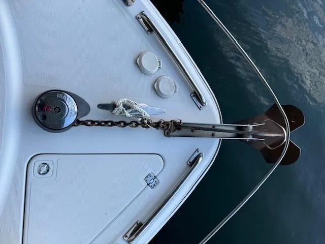 Why Knot Yacht Photos Pics Bow of 2003 Carver 410 Sport Sedan with anchor and chain.