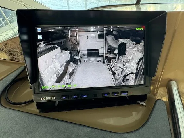 Why Knot Yacht Photos Pics Monitor displaying engine room of 2003 Carver 410 Sport Sedan yacht.