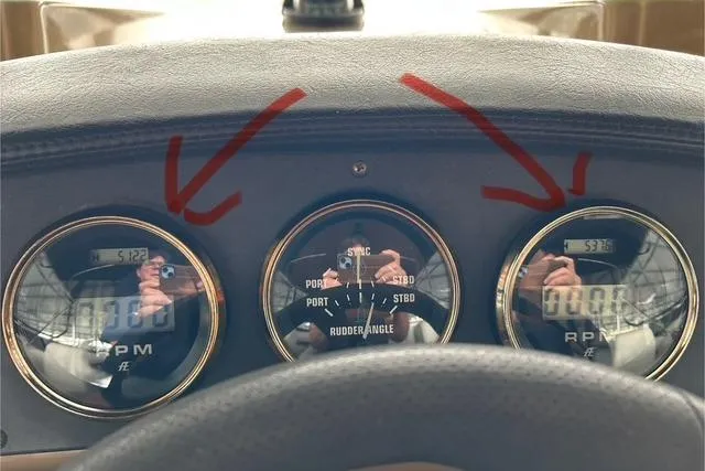 Why Knot Yacht Photos Pics Dashboard of 2003 Carver 410 Sport Sedan with RPM and rudder angle gauges.