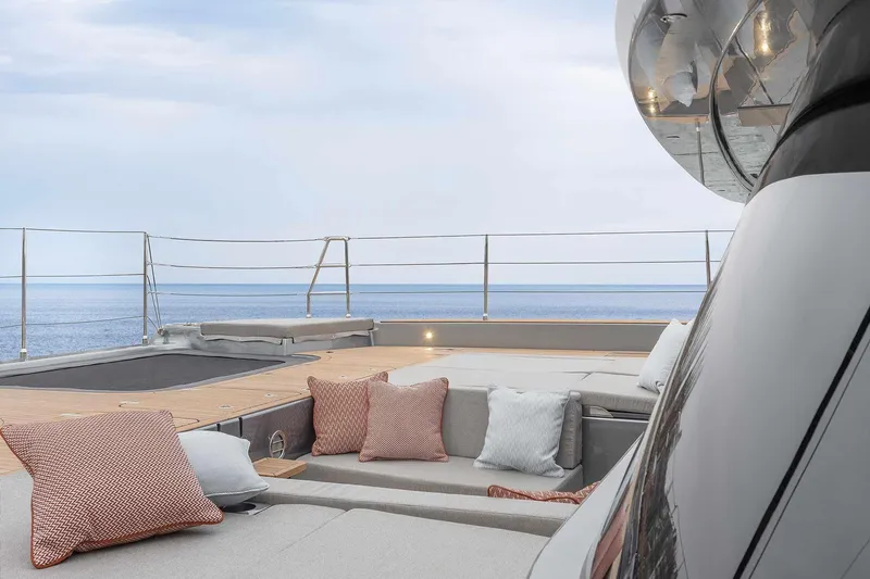  Yacht Photos Pics Luxurious Sunreef 50 yacht deck with cushions, ocean view, 2026 model.