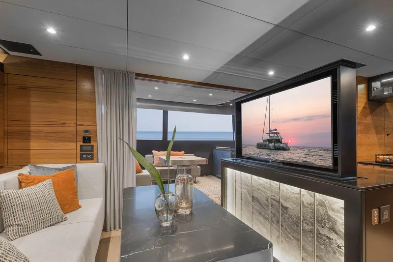  Yacht Photos Pics Luxurious interior of 2026 Sunreef 50 yacht with modern decor and ocean view.