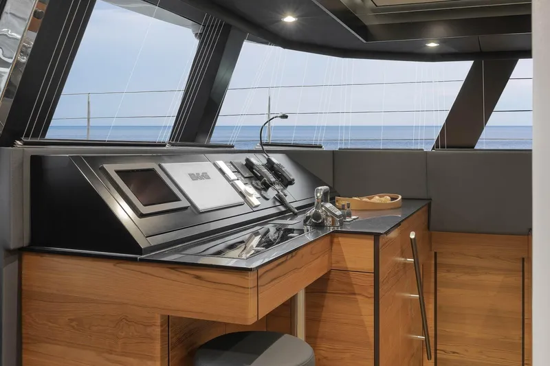  Yacht Photos Pics Luxurious helm station of 2026 Sunreef 50 yacht with modern navigation equipment.