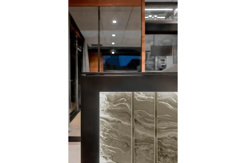  Yacht Photos Pics Interior view of 2026 Sunreef 50 yacht, featuring elegant marble design and modern lighting.