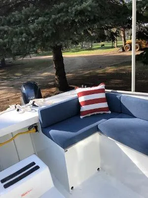  Yacht Photos Pics 2008 Custom Gasparek Marine Eco Trawler with blue seating and striped pillow.