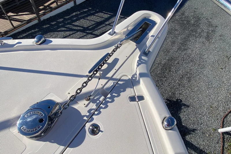  Yacht Photos Pics 2009 Pursuit OS 375 Offshore boat deck with anchor chain and winch system.