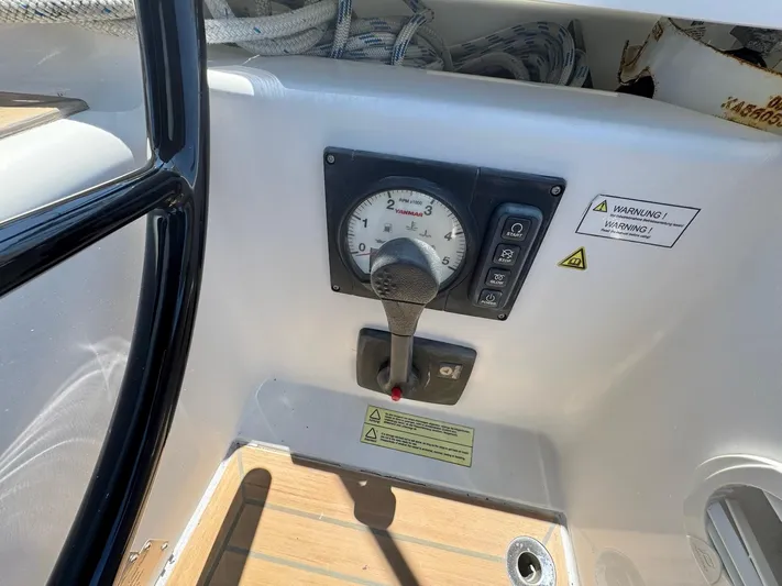 Ahyoka Yacht Photos Pics Control panel of a 2017 Hanse 345 sailboat with throttle and warning labels.
