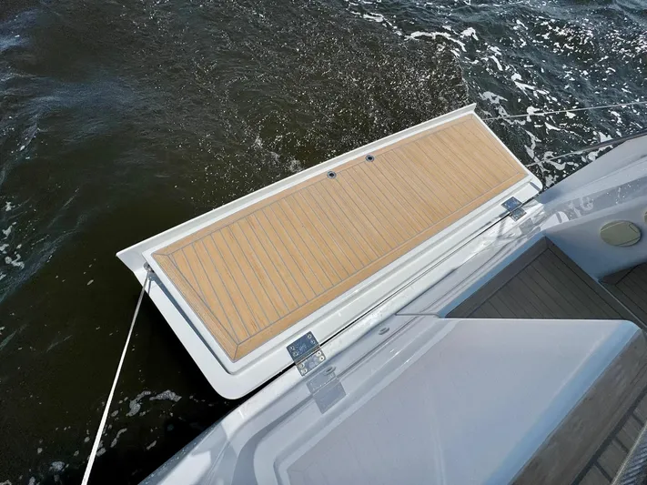 Ahyoka Yacht Photos Pics Sailing yacht Hanse 345 (2017) with open swim platform on water.