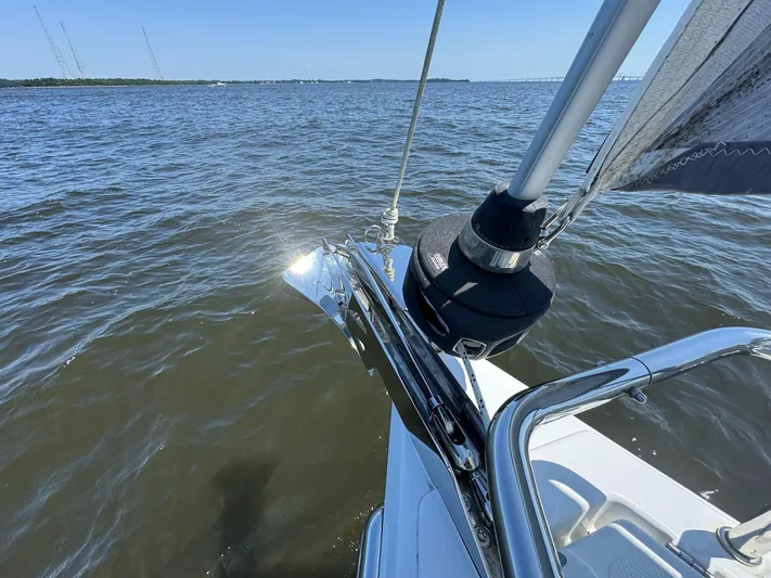 Ahyoka Yacht Photos Pics Sailing on a 2017 Hanse 345 yacht, glistening anchor over calm waters.