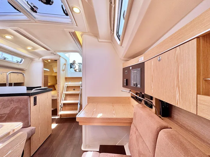 Ahyoka Yacht Photos Pics Interior of 2017 Hanse 345 yacht, featuring modern wood finishes and ample natural light.