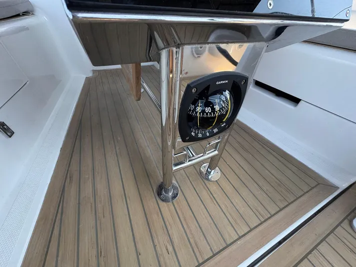 Ahyoka Yacht Photos Pics Compass on Hanse 345 yacht, 2017 model, with teak flooring.