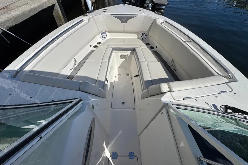  Yacht Photos Pics 2025 Sailfish 276 DC boat interior with spacious seating and modern design.