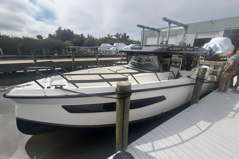  Yacht Photos Pics 2026 Navan C30 boat docked at marina, featuring sleek design and modern amenities.