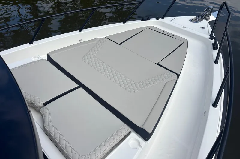  Yacht Photos Pics 2026 Navan C30 boat with cushioned deck, featuring sleek design and elegant stitching.