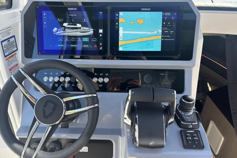  Yacht Photos Pics 2026 Navan C30 boat dashboard with dual Simrad displays and modern controls.