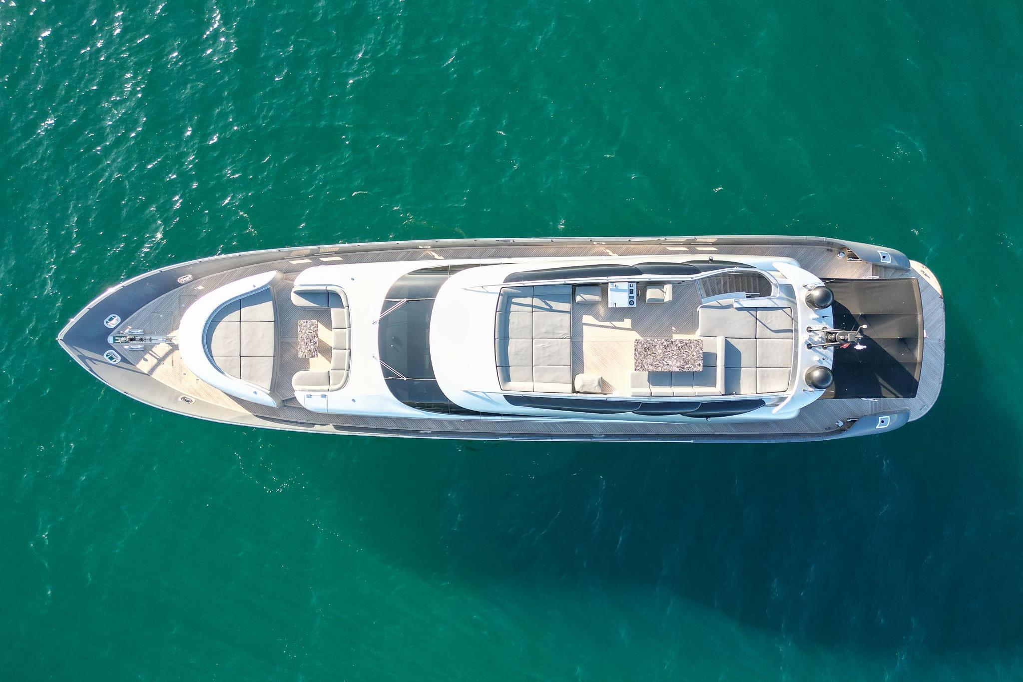 Aerial view of 2016 Fipa Group AB 100 yacht on turquoise water.