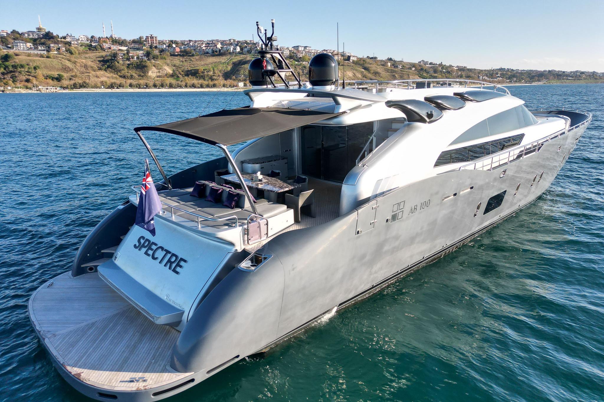 Luxurious 2016 Fipa Group AB 100 yacht "Spectre" cruising on serene waters.