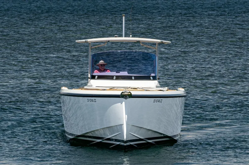 Intermezzo Yacht Photos Pics 2018 Fjord 36 Xpress boat cruising on calm water, front view.