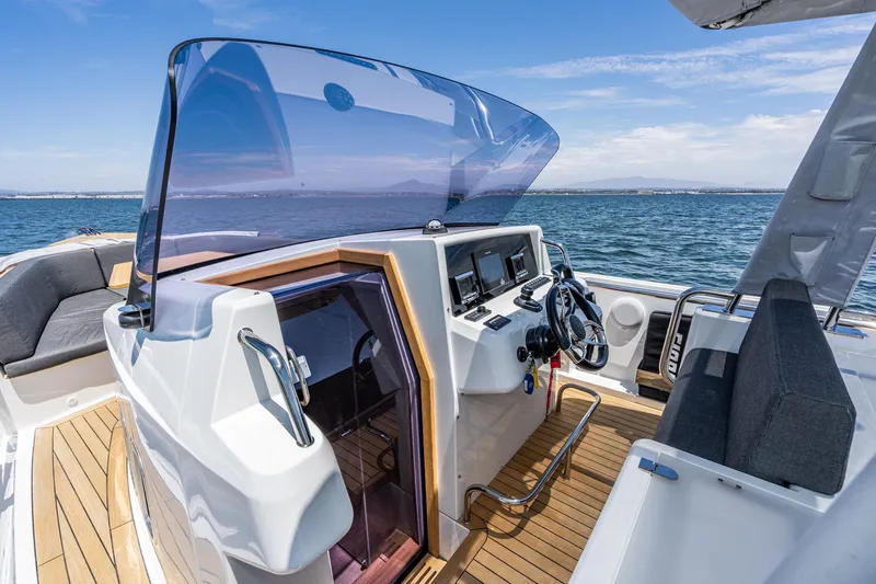 Intermezzo Yacht Photos Pics 2018 Fjord 36 Xpress boat cockpit with modern controls and ocean view.