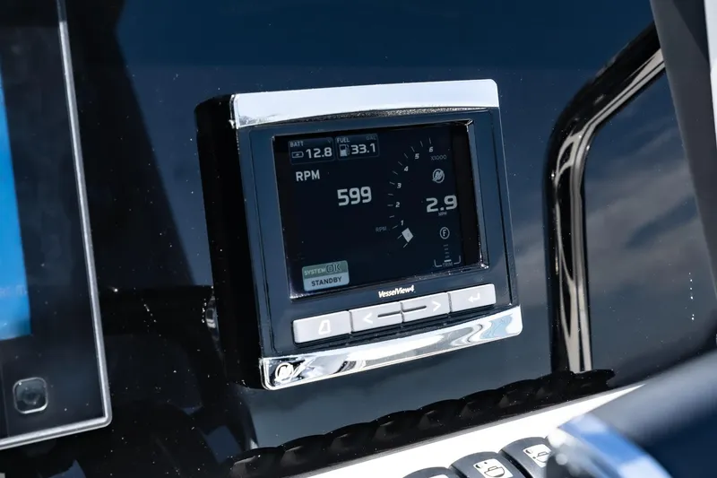 Intermezzo Yacht Photos Pics Close-up of 2018 Fjord 36 Xpress digital dashboard display showing RPM and fuel data.