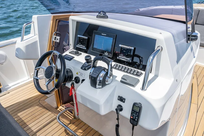 Intermezzo Yacht Photos Pics Helm of 2018 Fjord 36 Xpress boat with modern navigation equipment.
