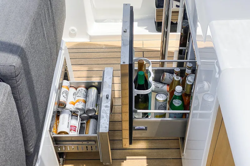 Intermezzo Yacht Photos Pics Built-in beverage storage on 2018 Fjord 36 Xpress boat with assorted drinks.