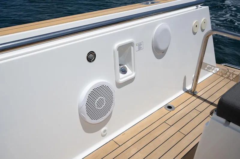 Intermezzo Yacht Photos Pics 2018 Fjord 36 Xpress boat deck with speaker and control panel.