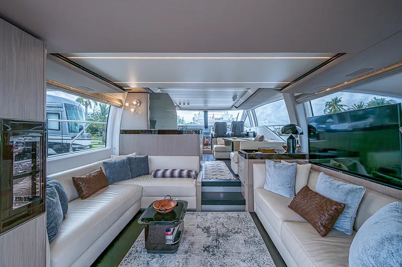 Evado Yacht Photos Pics Luxurious interior of 2020 Azimut 66 yacht with elegant seating and modern decor.