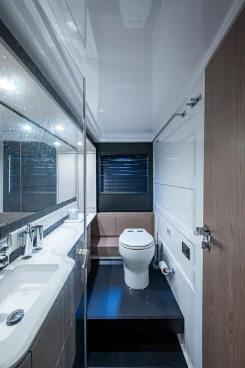 Evado Yacht Photos Pics Luxurious bathroom in 2020 Azimut 66 yacht with modern fixtures and sleek design.