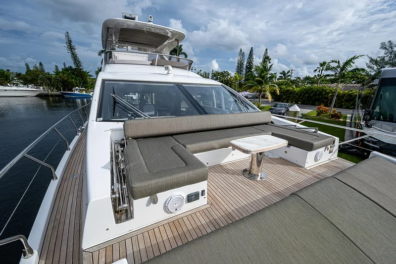 Evado Yacht Photos Pics Azimut 66 yacht 2020 model with spacious deck and seating area.