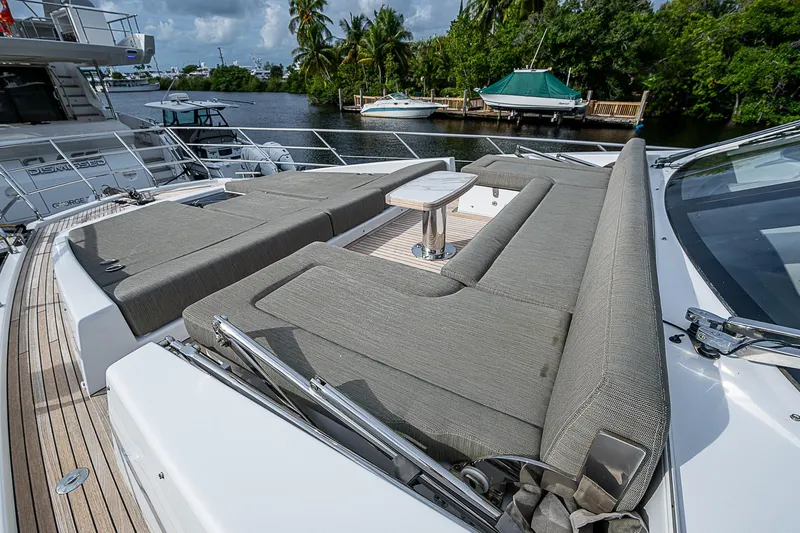Evado Yacht Photos Pics 2020 Azimut 66 yacht with spacious sun deck and luxurious seating.