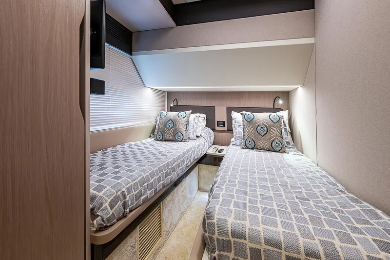 Evado Yacht Photos Pics Twin cabin interior of 2020 Azimut 66 yacht with modern decor.