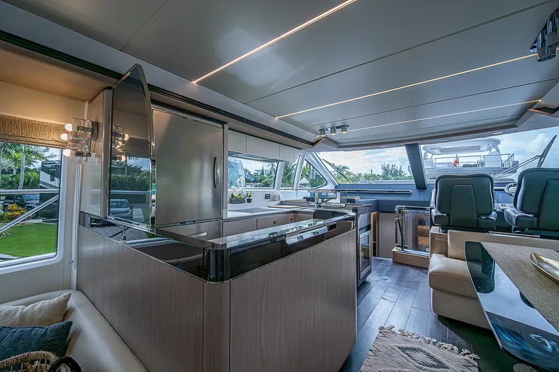 Evado Yacht Photos Pics Luxurious interior of 2020 Azimut 66 yacht with modern design and spacious seating.