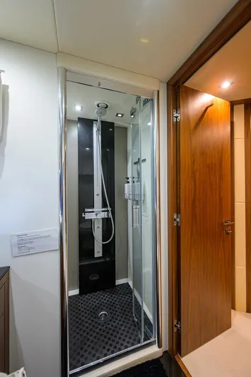 Catch The Wave Yacht Photos Pics Shower area in 2014 Sunseeker Manhattan 73 yacht, featuring modern design and fixtures.