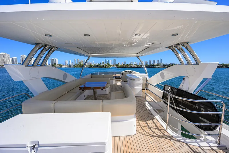 Catch The Wave Yacht Photos Pics Luxurious 2014 Sunseeker Manhattan 73 yacht with spacious deck and modern seating.