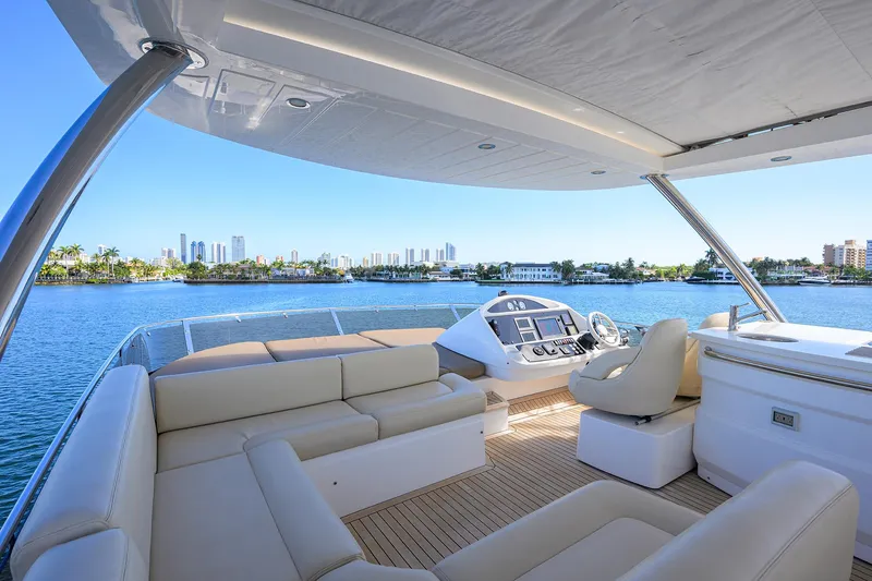Catch The Wave Yacht Photos Pics Luxurious 2014 Sunseeker Manhattan 73 yacht interior with scenic waterfront view.