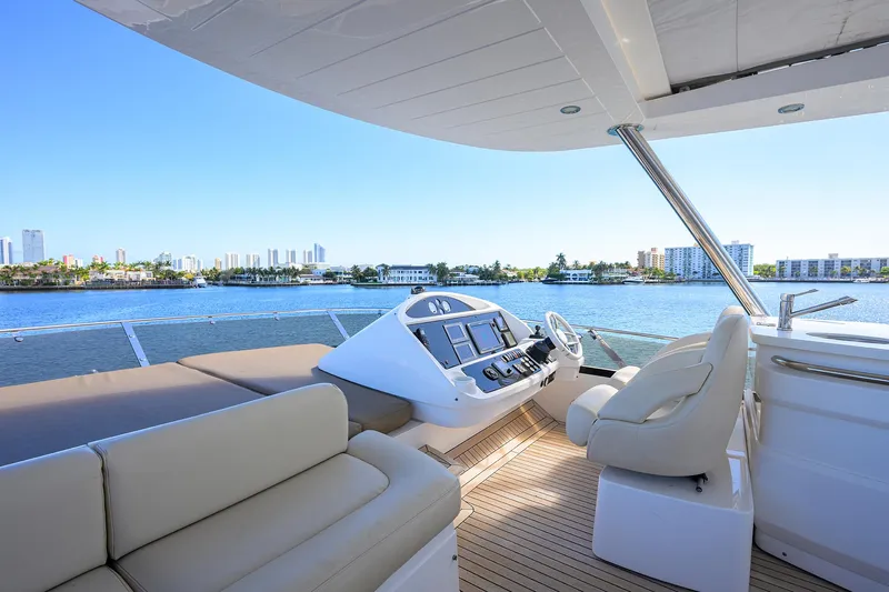 Catch The Wave Yacht Photos Pics Luxurious 2014 Sunseeker Manhattan 73 yacht interior with scenic waterfront view.