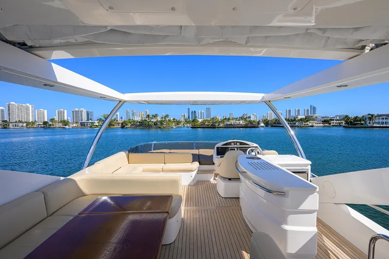 Catch The Wave Yacht Photos Pics Luxurious 2014 Sunseeker Manhattan 73 yacht interior with scenic waterfront view.