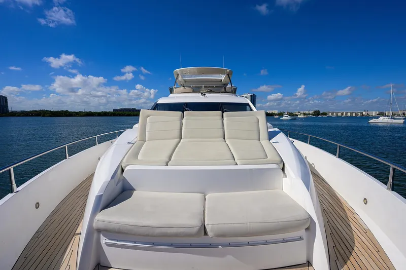 Catch The Wave Yacht Photos Pics Luxurious 2014 Sunseeker Manhattan 73 yacht with spacious sunbathing deck on calm waters.