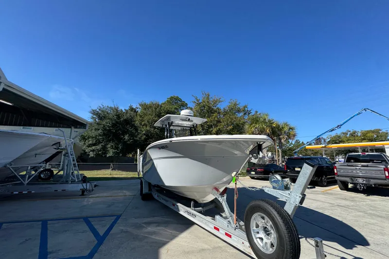  Yacht Photos Pics 2022 Sea Fox 288 Commander boat on trailer under clear blue sky.