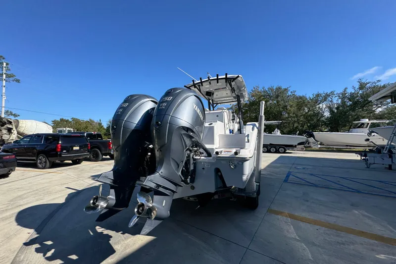  Yacht Photos Pics 2022 Sea Fox 288 Commander with dual Yamaha outboard engines in a marina setting.