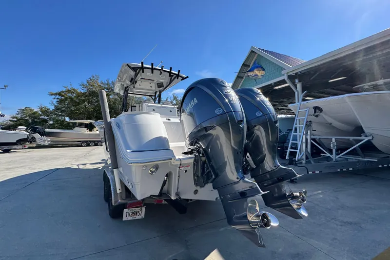  Yacht Photos Pics 2022 Sea Fox 288 Commander boat with dual Yamaha engines in a marina setting.