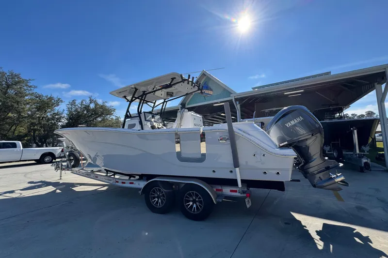  Yacht Photos Pics 2022 Sea Fox 288 Commander boat on trailer under sunny sky.