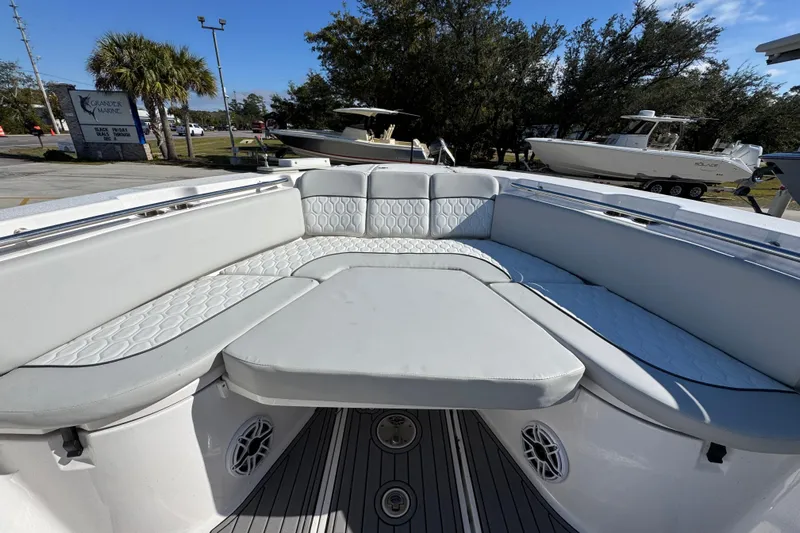  Yacht Photos Pics 2022 Sea Fox 288 Commander boat interior with cushioned seating and modern design.