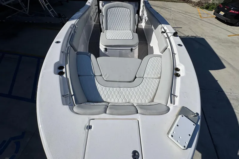  Yacht Photos Pics 2022 Sea Fox 288 Commander boat interior with cushioned seating and sleek design.