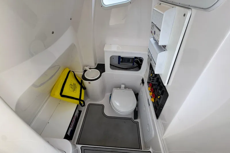  Yacht Photos Pics Interior of 2022 Sea Fox 288 Commander boat with toilet and control panel.