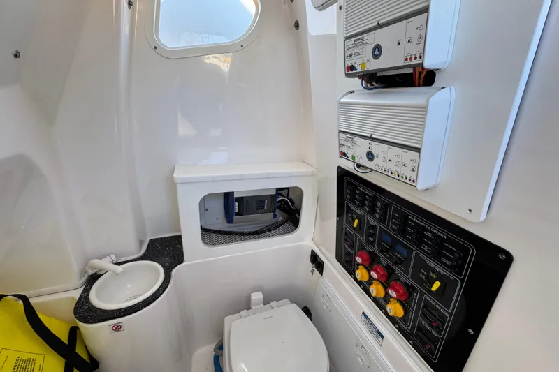 Yacht Photos Pics Interior of 2022 Sea Fox 288 Commander boat with control panels and compact sink.