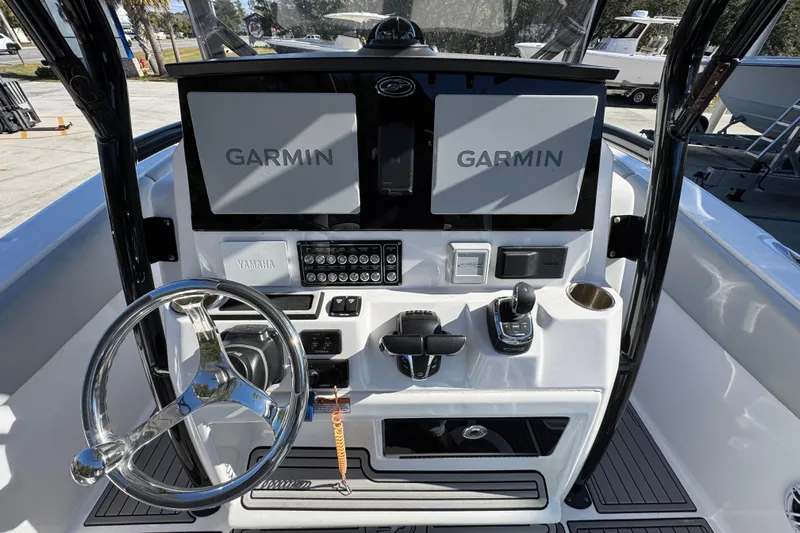 Yacht Photos Pics 2022 Sea Fox 288 Commander boat dashboard with Garmin displays and Yamaha controls.